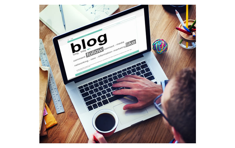 man creating a blog